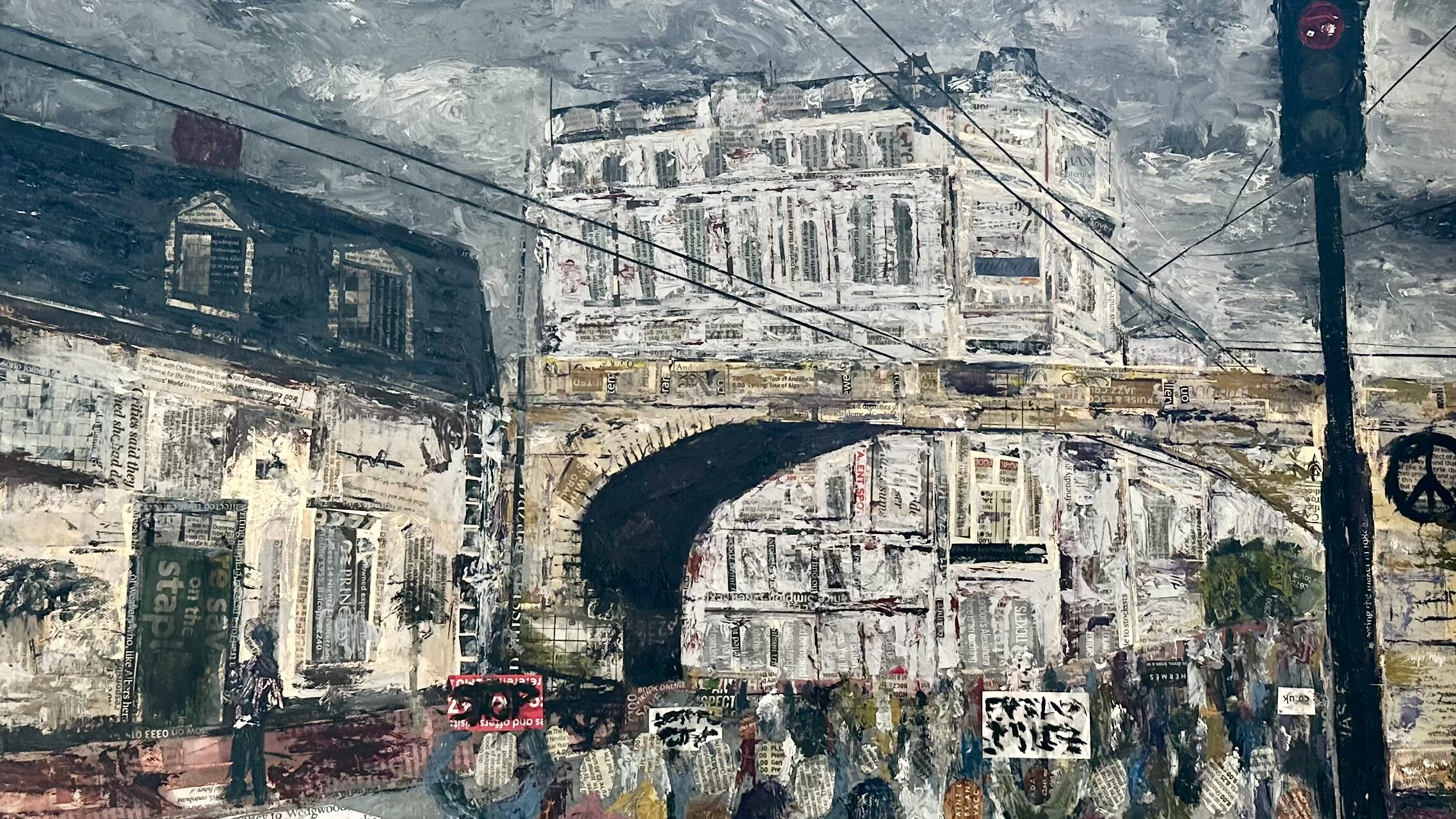 An oil painting with collaged newspaper on canvas, showing a city street scene with protestors gathered under a railway bridge.